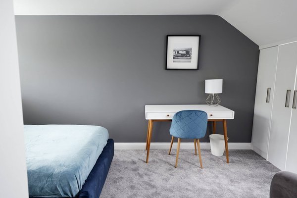 What are the benefits and challenges of converting commercial spaces into residential units?